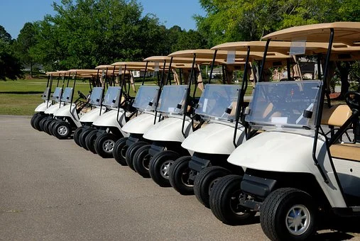 a line of golf carts